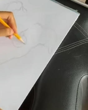 Step 1 of a portrait taking shape, from pencil to finished