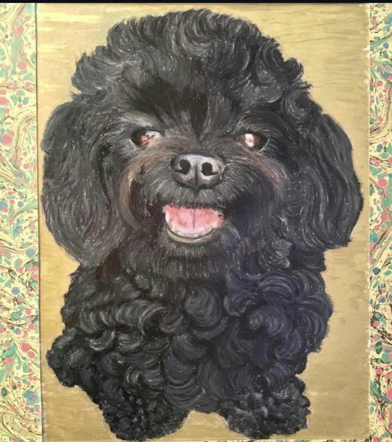 A soft pastel portrait of Kat's own dog, a black poodle, sitting on a gold ground with a marbled paper border.